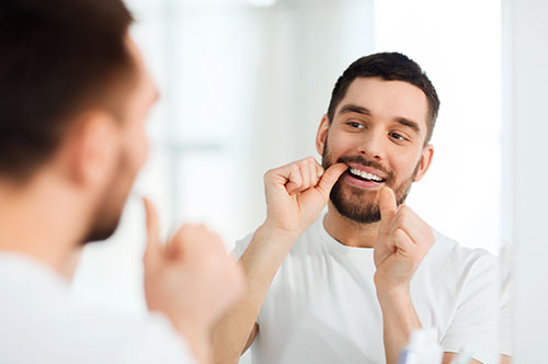 5 Benefits of Flossing & How to Do It Correctly